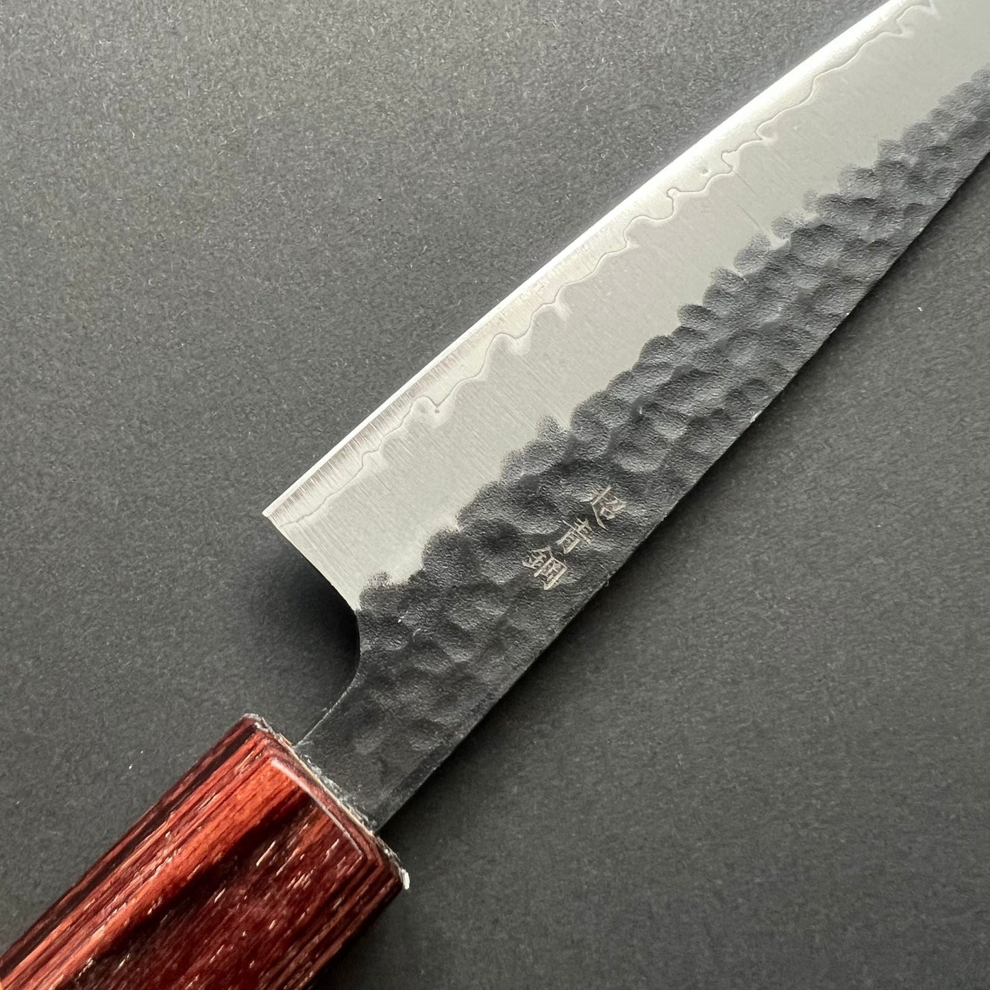 Petty knife, Aogami Super carbon steel with stainless steel cladding, Kurouchi Tsuchime finish, Wa handle - Sakai Takayuki