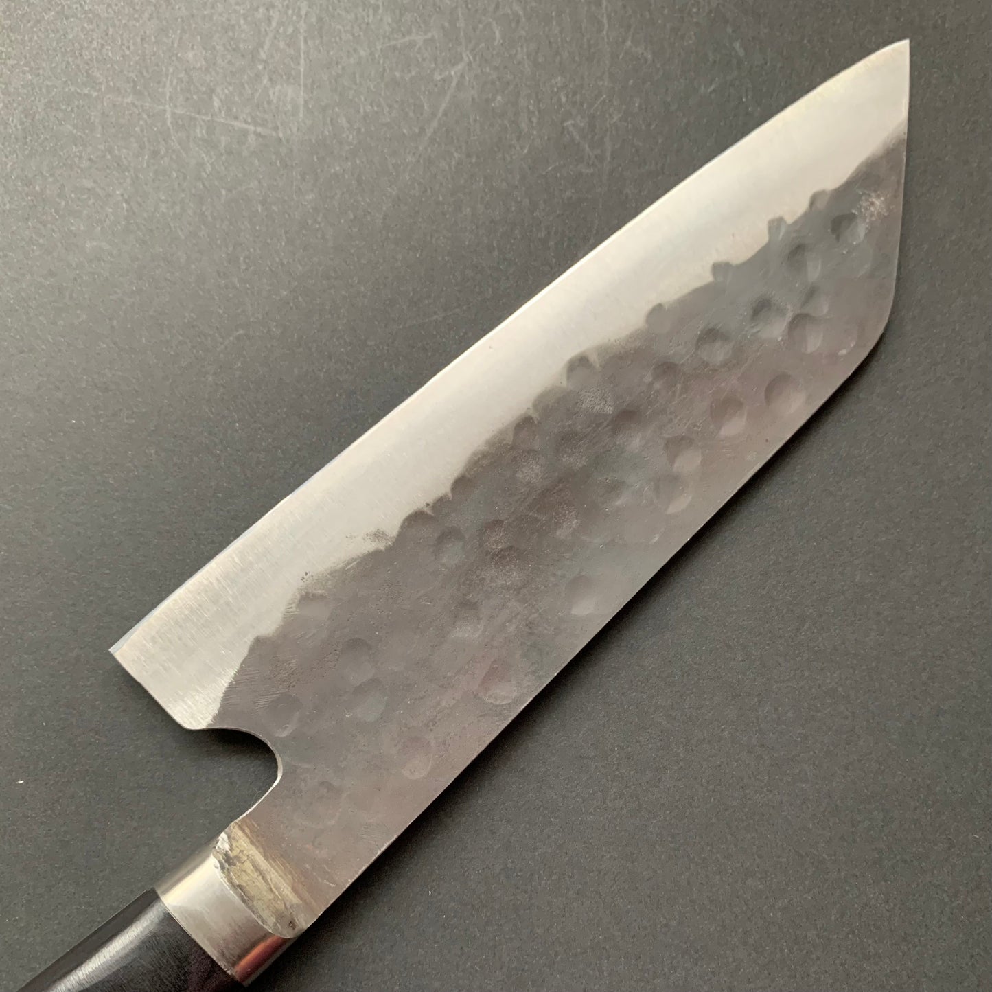 Santoku knife, Aogami super with stainless steel cladding, Tsuchime Kurouchi finish, Denka range, Western handle - Fujiwara