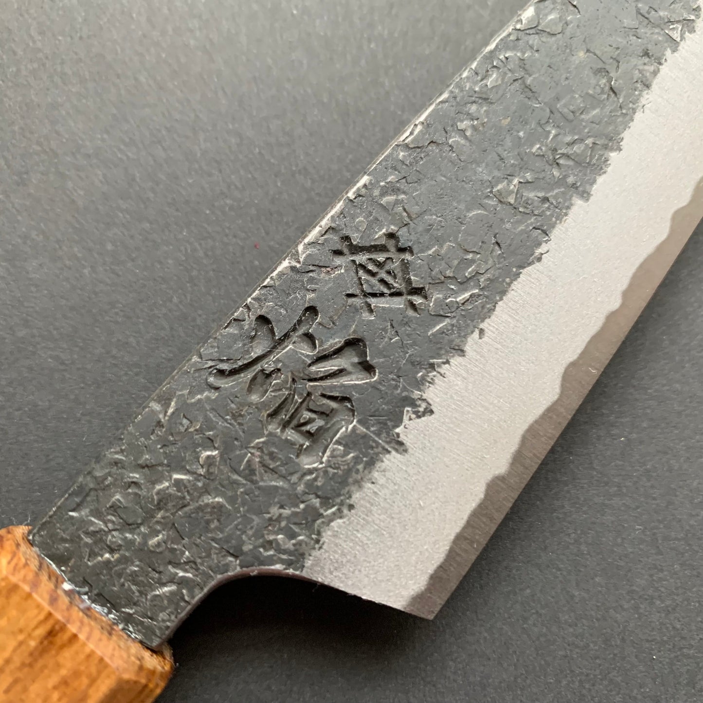 Kiritsuke Petty knife, Aogami 2 carbon steel with iron cladding, Kurouchi and Tsuchime finish, Homura series - Sakai Takayuki