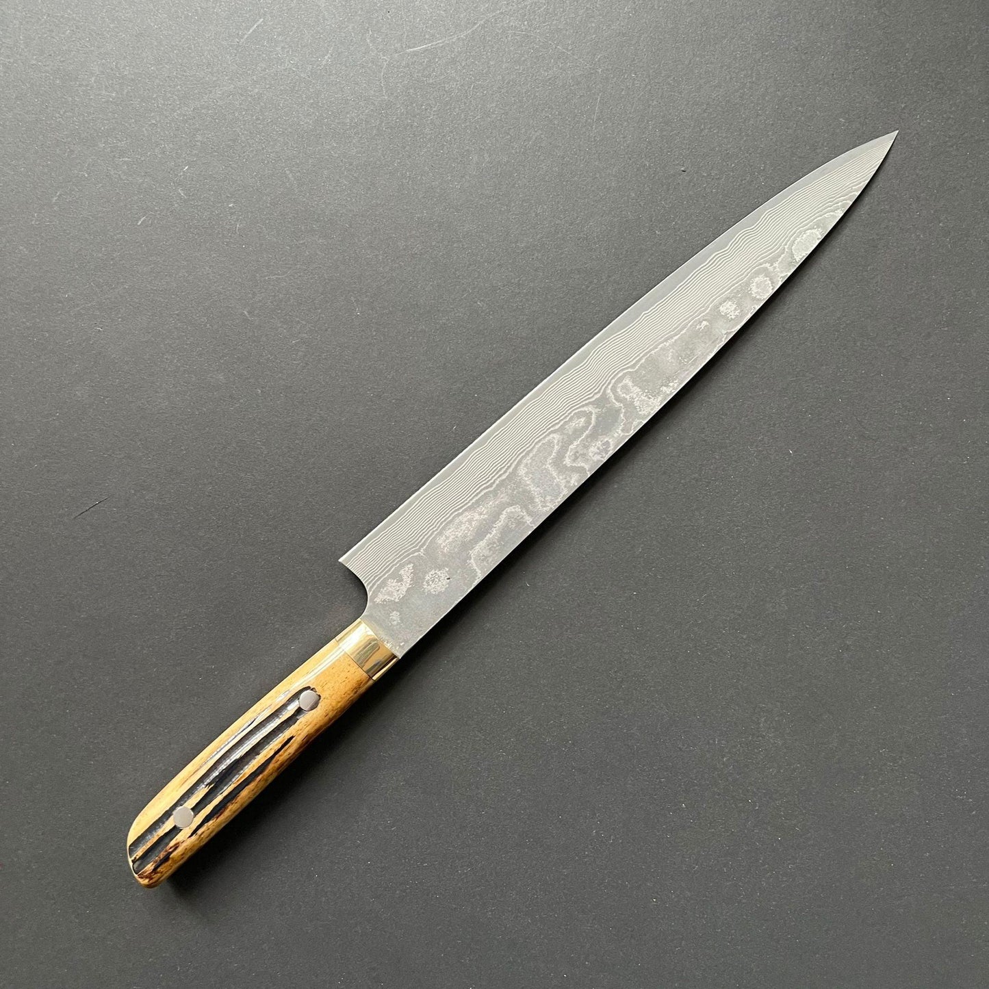 Sujihiki knife, VG10 Stainless Steel, Damascus finish, Dyed Cow Horn western style handle - Saji