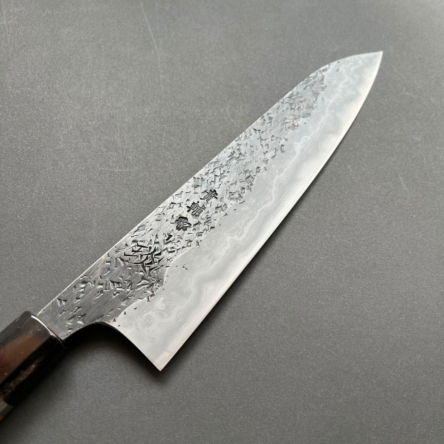 Gyuto knife, Aogami 1 with soft iron / Aogami 2 Damascus and Kurouchi finish - Manaka Kisuke