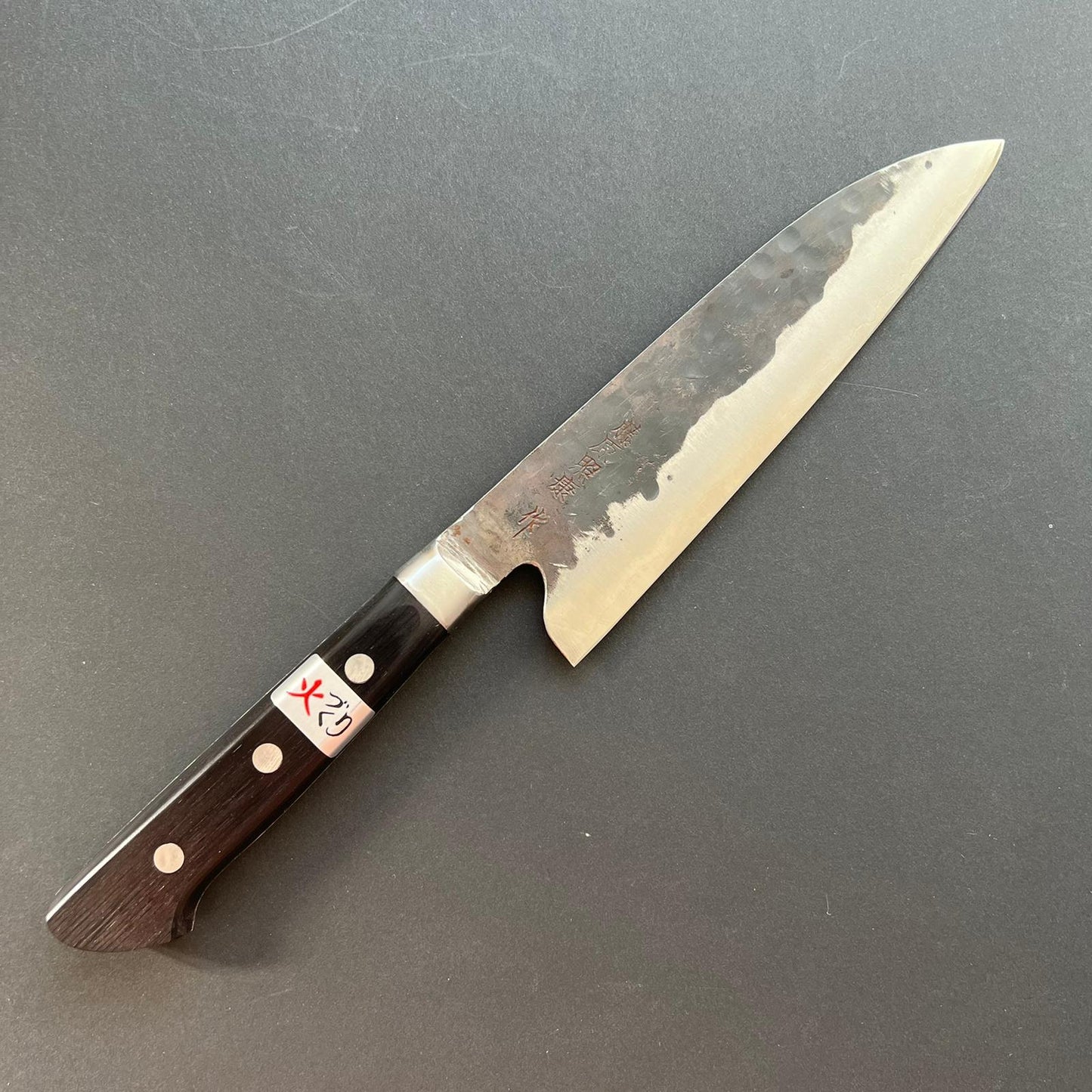 Gyuto knife, Aogami super with stainless steel cladding, Tsuchime Kurouchi finish, Denka range, western handle - Fujiwara
