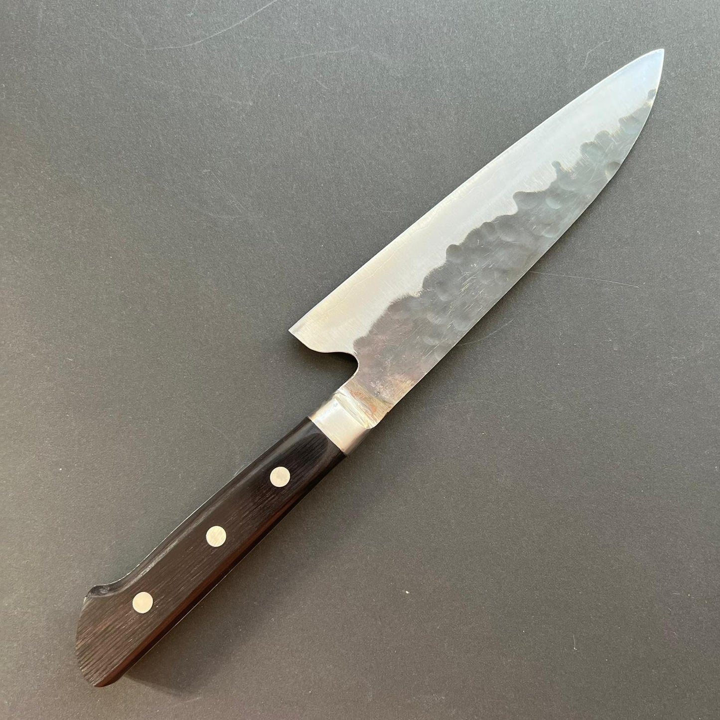 Gyuto knife, Aogami super with stainless steel cladding, Tsuchime Kurouchi finish, Denka range, western handle - Fujiwara