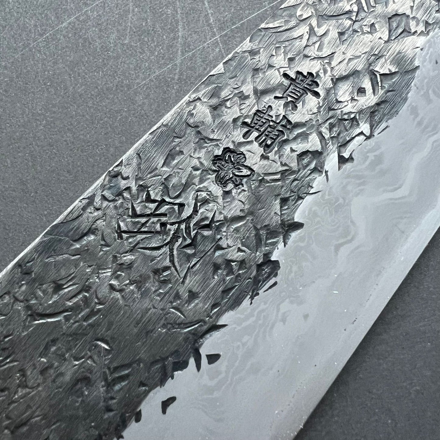 Gyuto knife, Aogami 1 with soft iron cladding,  Damascus and Kurouchi finish - Manaka Kisuke