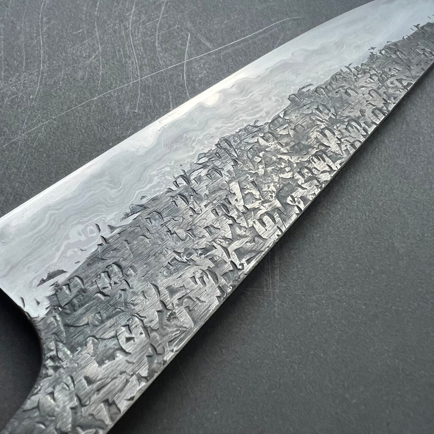Gyuto knife, Aogami 1 with soft iron cladding,  Damascus and Kurouchi finish - Manaka Kisuke