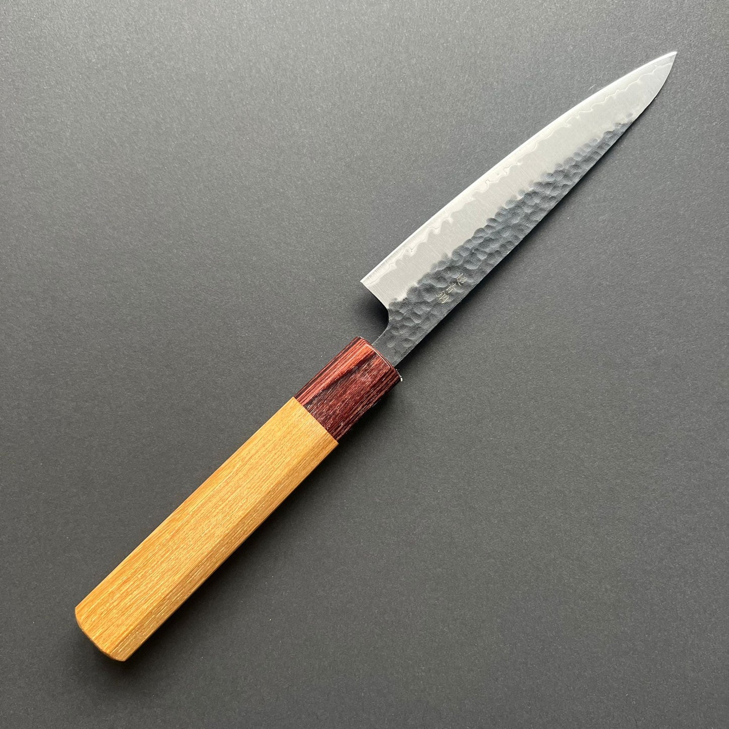 Petty knife, Aogami Super carbon steel with stainless steel cladding, Kurouchi Tsuchime finish, Wa handle - Sakai Takayuki