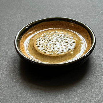 Ceramic dish grater