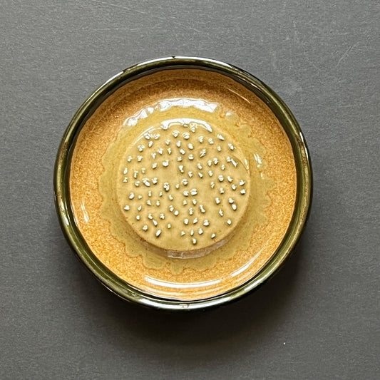 Ceramic dish grater